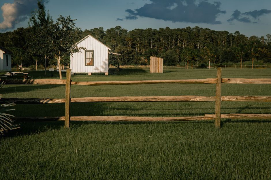 Wood privacy fence beside a home