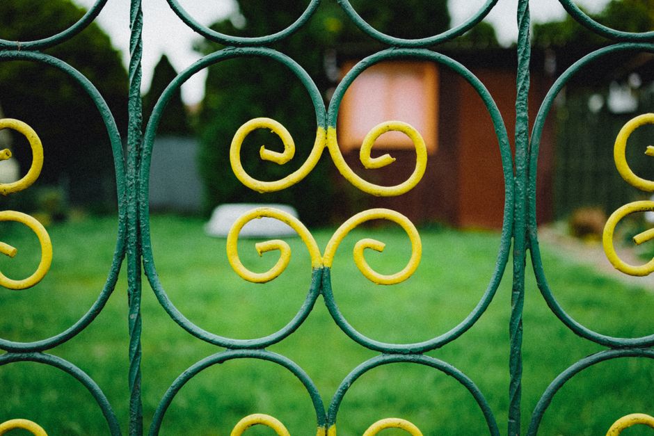 Iron fence around a garden