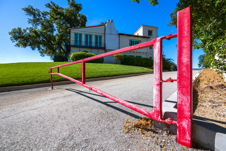 Automatic driveway gate at a property entrance